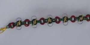 Anodized aluminum rings and aluminum beads colors: black, gold, frost, red, and green weave: honeybees and flowers size: 3/8 x 8  1/4