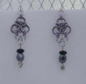 Anodized aluminum rings and beads colors: black ice, lavender, and bright silver weave: aura size: 