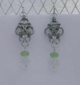 Anodized aluminum rings with crystal beads colors: seafoam green and bright silver weave: aura size: 