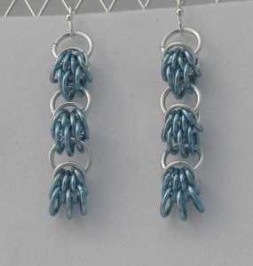 Anodized aluminum rings colors: sky and bright silver weave: scherzo size: