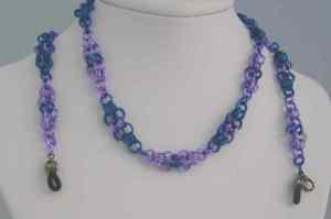 Anodized aluminum rings colors: royal blue, purple weave: Asian bicycles size: 25 includes clasp to allow use as necklace