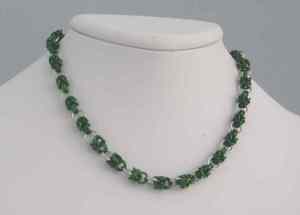 Anodized aluminum rings colors: green and seafoam weave: half Byzantine plus 1 size: 18  1/4